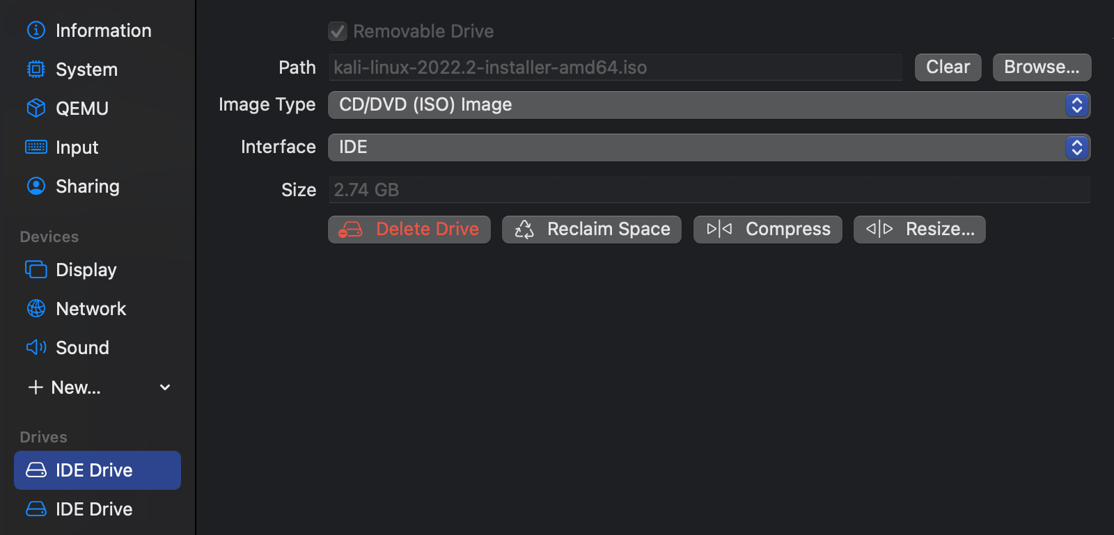 The first drive (the installer) is selected in the sidebar of the UTM settings page. The "Delete Drive" button in displayed in red.